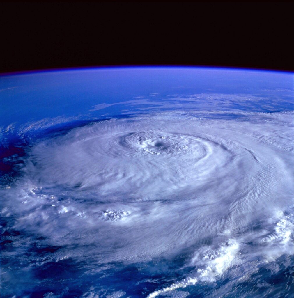 A breathtaking satellite image capturing a swirling hurricane over the Earth